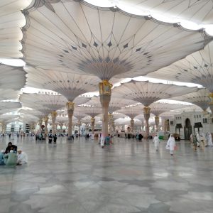 people walking inside white building