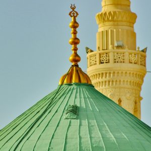 a large green dome with a gold top