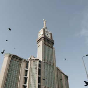 a tall building with a clock on the top of it